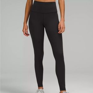 In brand new condition! Size 10 wunder tights. 28 inch